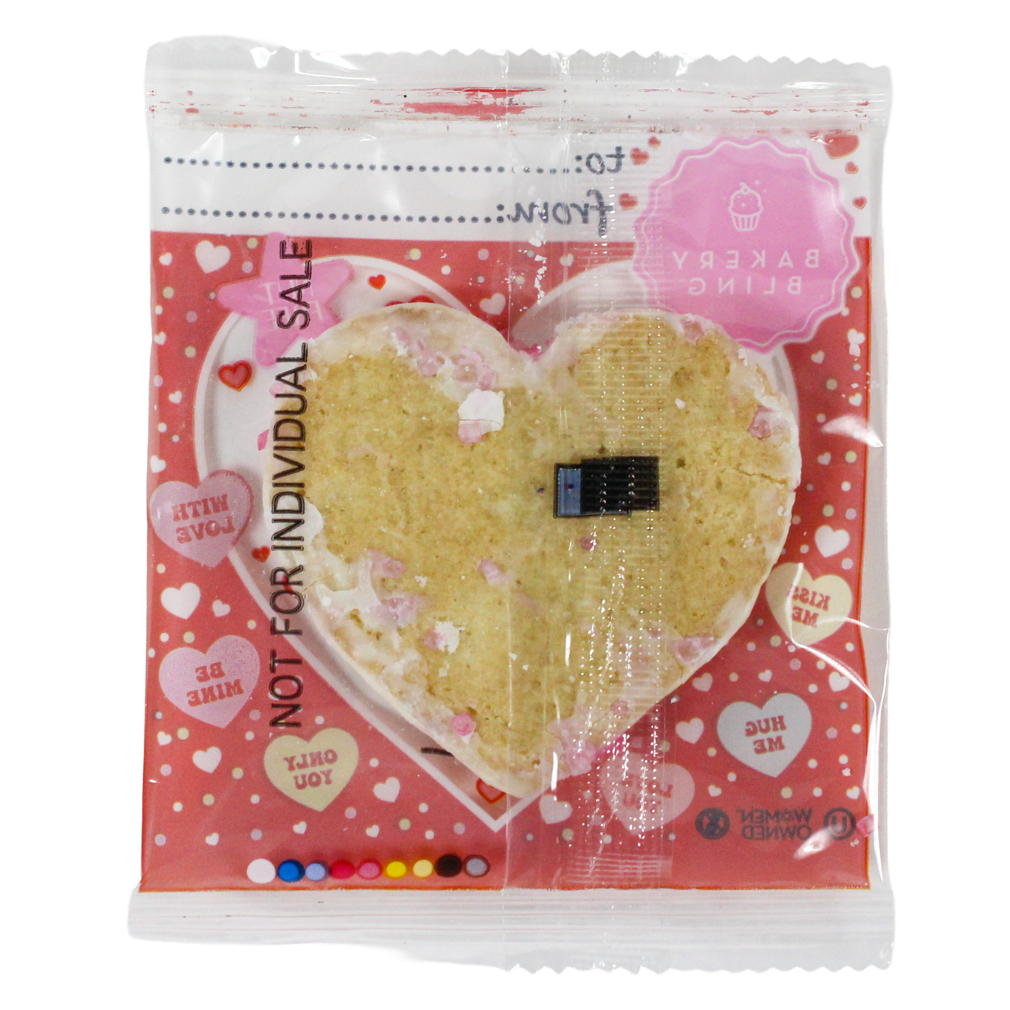 Heart-shaped cookie clear packaging with pink and white decorative elements for Valentines Day parties.